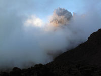 La pta Nelion tra le nuvole al tramonto