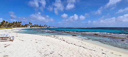 La spiaggia est dell'Half Moon Caye 