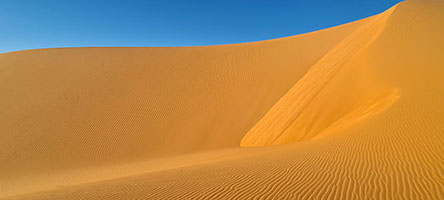 Dune dell'erg di Baiga al tramonto