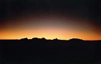 Alba dallo Sperone della Brenva, sullo sfondo il Cervino ed il Rosa