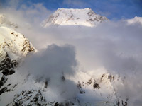 Particolare della vetta tra le nuvole